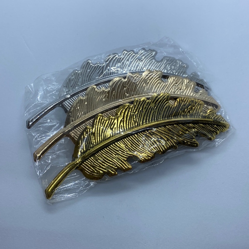 Set of three feather hair clips